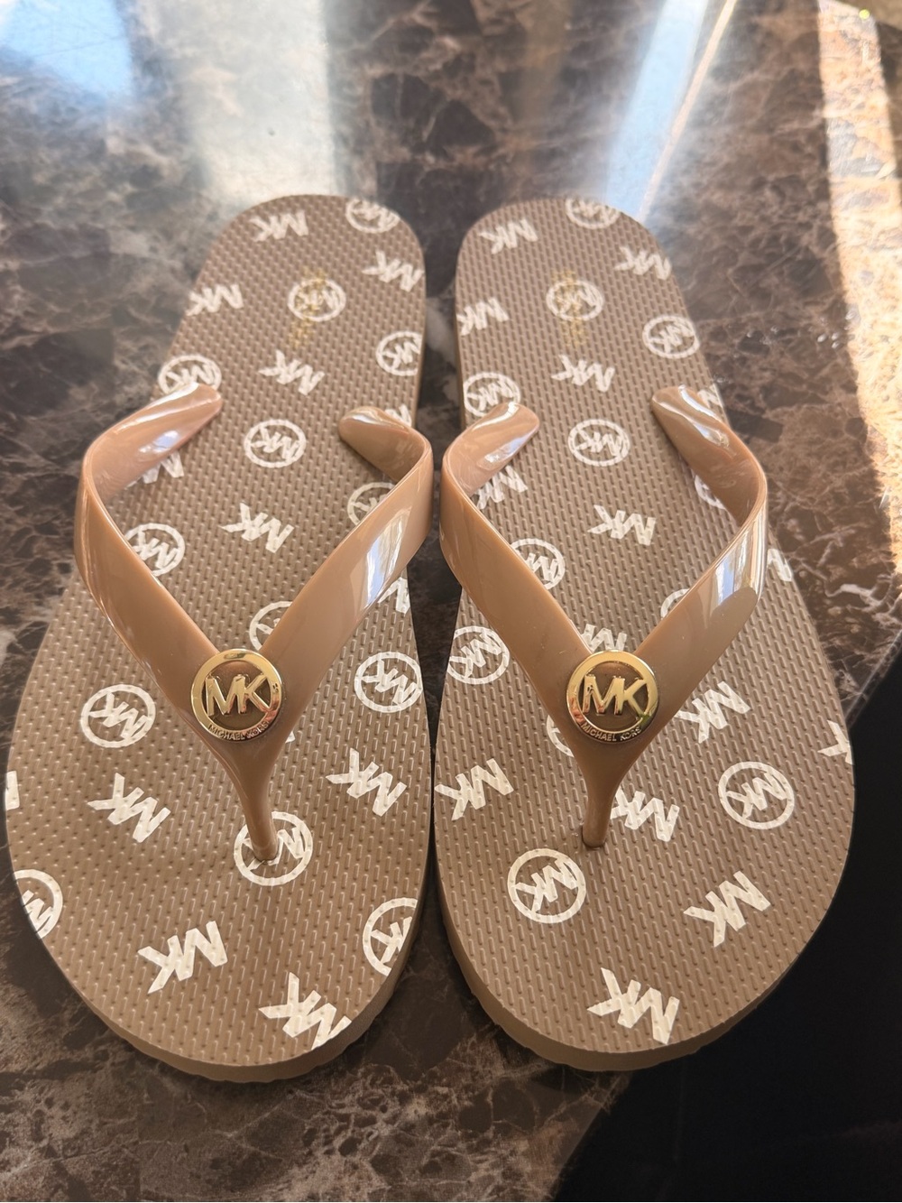 Michael Kors Tan Logo Jelly Flip Flops with Gold MK Emblems